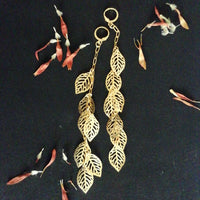 Boucles d'Oreilles et ses Sept Feuilles Dorées