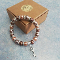 Bracelet de Perles et Sa Clef