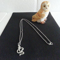 Collier et son Cobra