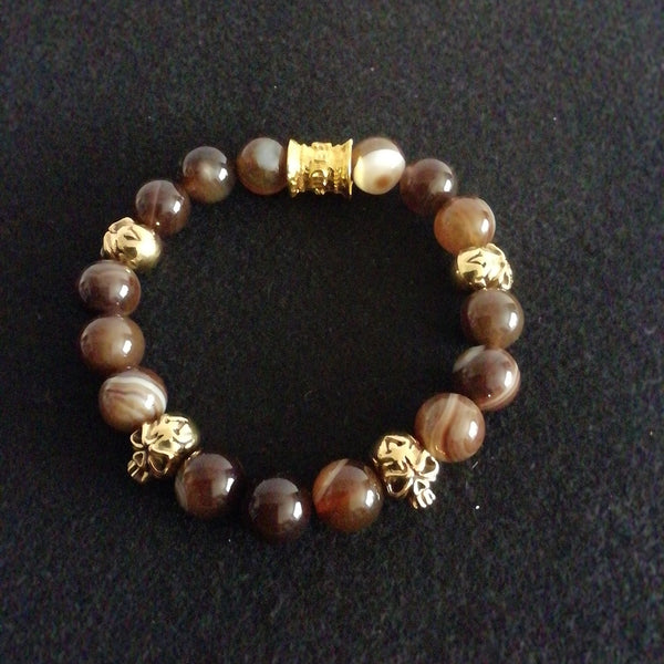 Bracelet avec Perles Café Rayure Agate et Quatre Têtes de Mort