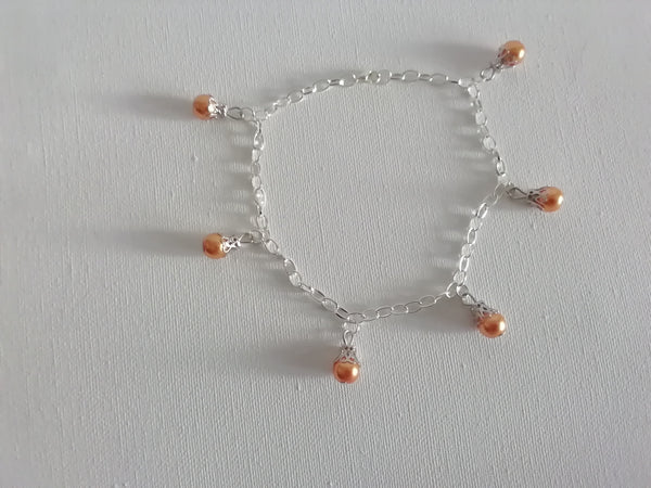 Tour de cheville avec 6 Perles Brillantes couleur Abricot