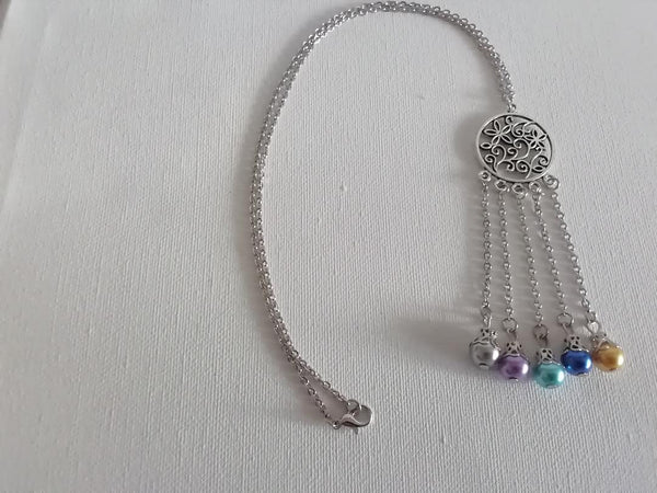 Collier avec Breloque et ses 5 Perles